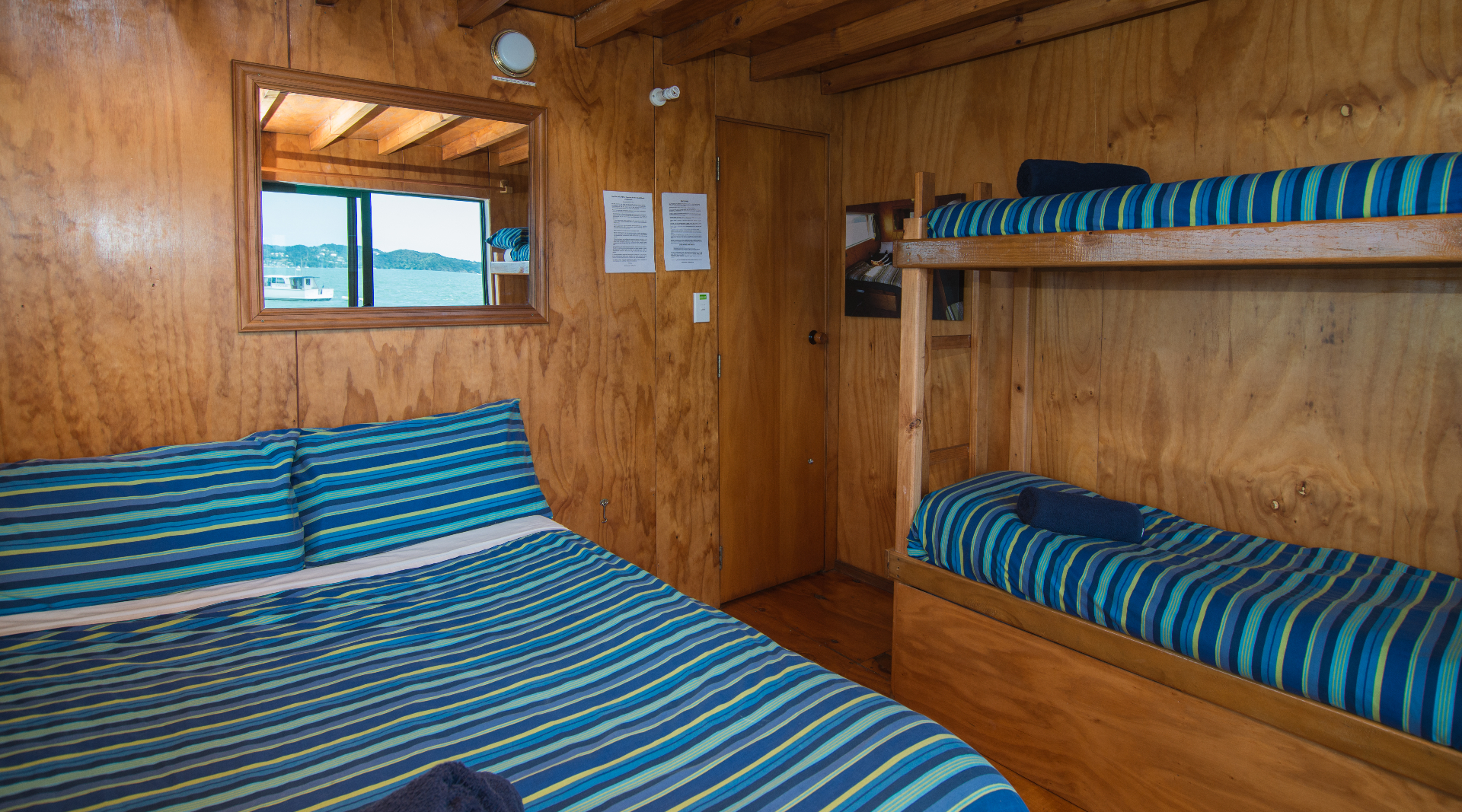 Family cabin onboard The Rock with a double bed and bunks
